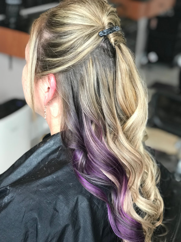 Picture of client is half up half down curled